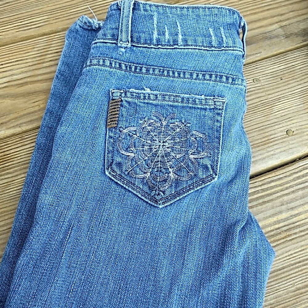 Paige Jeans with detail pockets. Fit amazing.